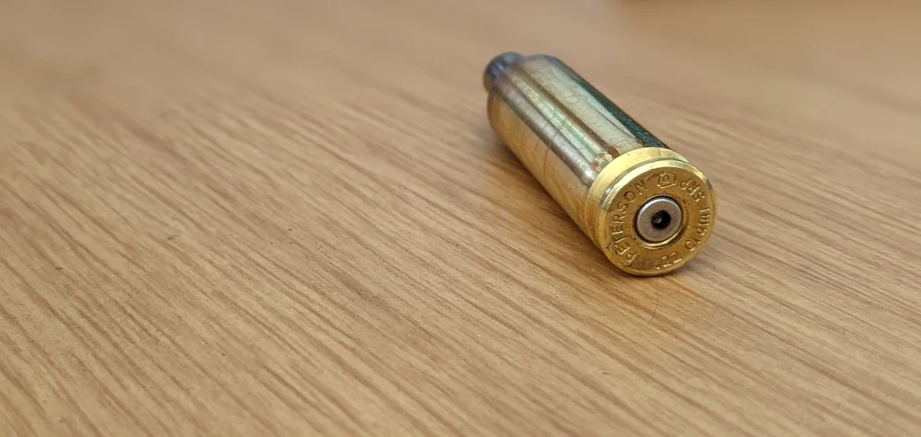 a punctured primer in a fired case