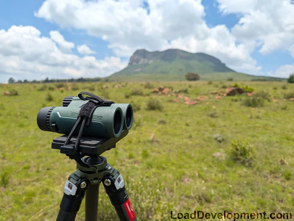 Vector optics binoculars tested in the field on a tripod mount.